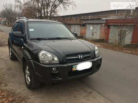 Чорний Хендай Туксон, об'ємом двигуна 2 л та пробігом 190 тис. км за 8300 $, фото 1 на Automoto.ua