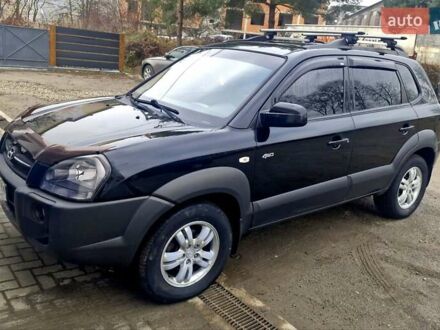 Черный Хендай Туксон, объемом двигателя 2 л и пробегом 206 тыс. км за 6900 $, фото 1 на Automoto.ua