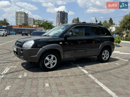 Чорний Хендай Туксон, об'ємом двигуна 1.98 л та пробігом 130 тис. км за 7990 $, фото 1 на Automoto.ua