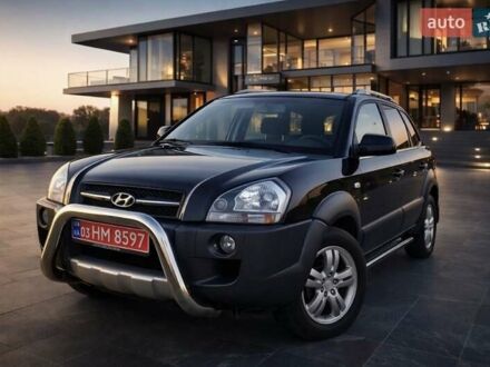 Черный Хендай Туксон, объемом двигателя 2 л и пробегом 200 тыс. км за 8500 $, фото 1 на Automoto.ua