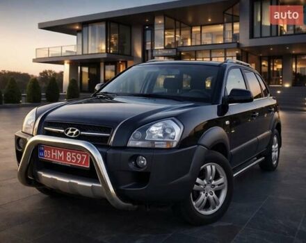 Черный Хендай Туксон, объемом двигателя 2 л и пробегом 200 тыс. км за 8500 $, фото 1 на Automoto.ua