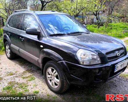 Черный Хендай Туксон, объемом двигателя 2 л и пробегом 262 тыс. км за 7500 $, фото 1 на Automoto.ua