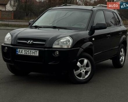 Черный Хендай Туксон, объемом двигателя 1.98 л и пробегом 260 тыс. км за 6900 $, фото 1 на Automoto.ua