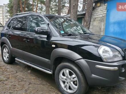Черный Хендай Туксон, объемом двигателя 2 л и пробегом 207 тыс. км за 8200 $, фото 1 на Automoto.ua