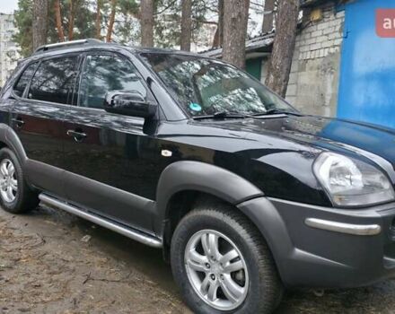 Черный Хендай Туксон, объемом двигателя 2 л и пробегом 207 тыс. км за 8200 $, фото 1 на Automoto.ua