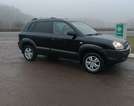 Чорний Хендай Туксон, об'ємом двигуна 2 л та пробігом 260 тис. км за 8450 $, фото 1 на Automoto.ua