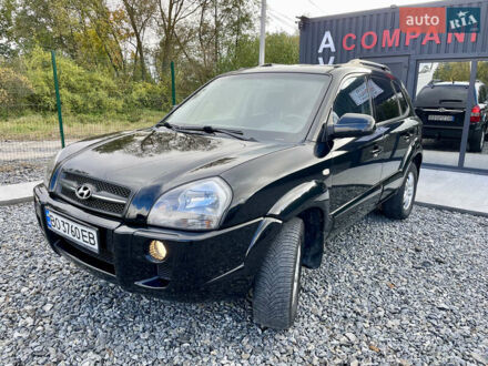 Черный Хендай Туксон, объемом двигателя 2 л и пробегом 224 тыс. км за 7750 $, фото 1 на Automoto.ua