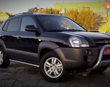 Черный Хендай Туксон, объемом двигателя 2 л и пробегом 229 тыс. км за 8700 $, фото 1 на Automoto.ua