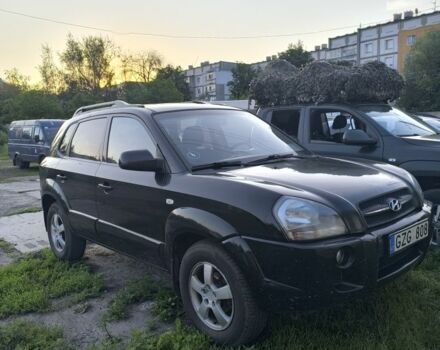 Черный Хендай Туксон, объемом двигателя 2 л и пробегом 200 тыс. км за 4200 $, фото 1 на Automoto.ua