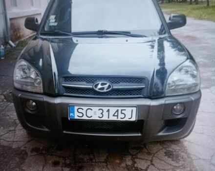 Черный Хендай Туксон, объемом двигателя 2 л и пробегом 350 тыс. км за 3650 $, фото 1 на Automoto.ua