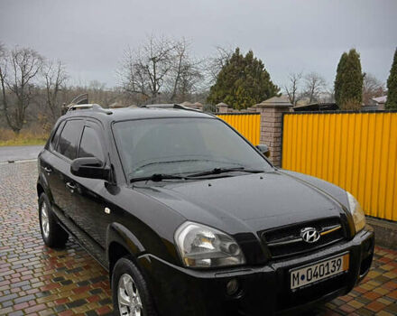 Черный Хендай Туксон, объемом двигателя 2 л и пробегом 151 тыс. км за 9100 $, фото 1 на Automoto.ua