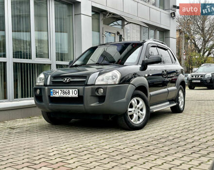 Черный Хендай Туксон, объемом двигателя 2.66 л и пробегом 145 тыс. км за 8900 $, фото 1 на Automoto.ua