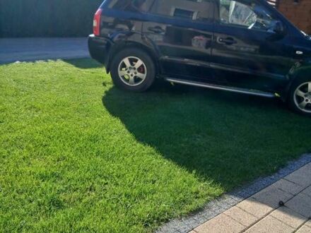 Черный Хендай Туксон, объемом двигателя 2 л и пробегом 15 тыс. км за 6200 $, фото 1 на Automoto.ua