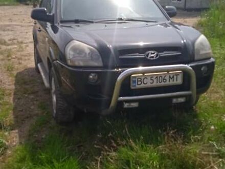 Черный Хендай Туксон, объемом двигателя 1.98 л и пробегом 222 тыс. км за 8200 $, фото 1 на Automoto.ua