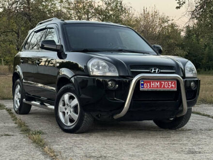 Чорний Хендай Туксон, об'ємом двигуна 1.98 л та пробігом 231 тис. км за 8350 $, фото 1 на Automoto.ua