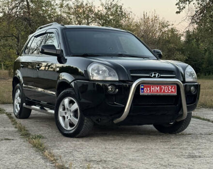 Чорний Хендай Туксон, об'ємом двигуна 1.98 л та пробігом 231 тис. км за 8350 $, фото 1 на Automoto.ua