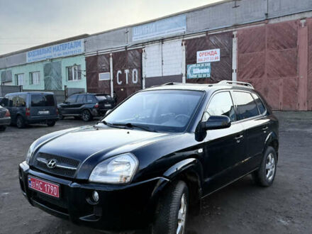 Черный Хендай Туксон, объемом двигателя 1.98 л и пробегом 230 тыс. км за 7750 $, фото 1 на Automoto.ua