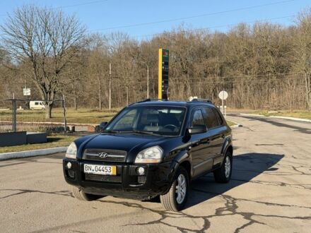 Черный Хендай Туксон, объемом двигателя 2 л и пробегом 221 тыс. км за 8600 $, фото 1 на Automoto.ua