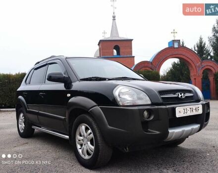 Черный Хендай Туксон, объемом двигателя 1.98 л и пробегом 182 тыс. км за 8150 $, фото 1 на Automoto.ua