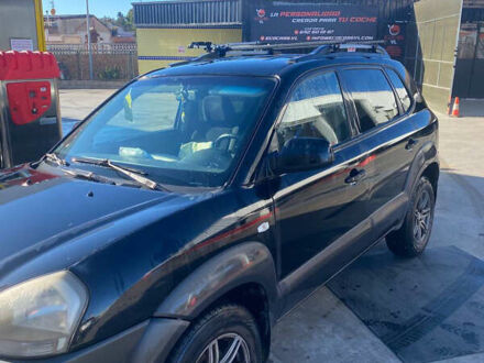 Чорний Хендай Туксон, об'ємом двигуна 1.98 л та пробігом 215 тис. км за 7540 $, фото 1 на Automoto.ua