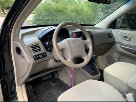 Чорний Хендай Туксон, об'ємом двигуна 2 л та пробігом 208 тис. км за 8100 $, фото 1 на Automoto.ua