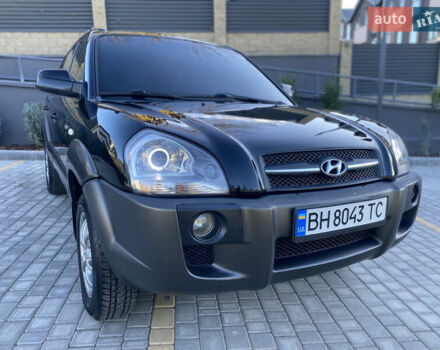 Черный Хендай Туксон, объемом двигателя 1.98 л и пробегом 180 тыс. км за 8999 $, фото 1 на Automoto.ua