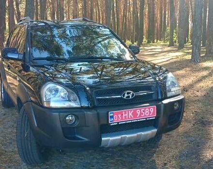 Черный Хендай Туксон, объемом двигателя 1.98 л и пробегом 236 тыс. км за 7600 $, фото 1 на Automoto.ua