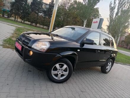 Черный Хендай Туксон, объемом двигателя 2 л и пробегом 192 тыс. км за 7950 $, фото 1 на Automoto.ua