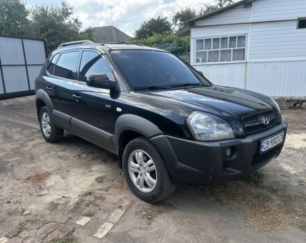 Черный Хендай Туксон, объемом двигателя 2 л и пробегом 270 тыс. км за 6300 $, фото 1 на Automoto.ua