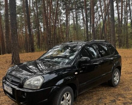 Черный Хендай Туксон, объемом двигателя 2 л и пробегом 240 тыс. км за 8800 $, фото 1 на Automoto.ua