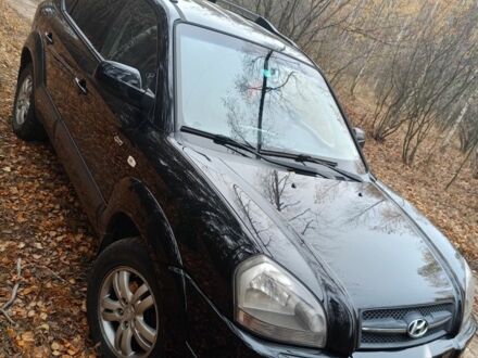 Чорний Хендай Туксон, об'ємом двигуна 2 л та пробігом 240 тис. км за 8800 $, фото 1 на Automoto.ua
