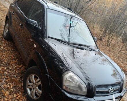 Чорний Хендай Туксон, об'ємом двигуна 2 л та пробігом 240 тис. км за 8800 $, фото 1 на Automoto.ua