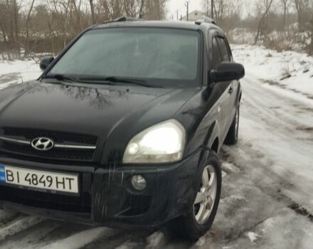 Черный Хендай Туксон, объемом двигателя 2 л и пробегом 255 тыс. км за 8300 $, фото 1 на Automoto.ua