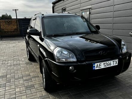 Чорний Хендай Туксон, об'ємом двигуна 2 л та пробігом 240 тис. км за 8600 $, фото 1 на Automoto.ua