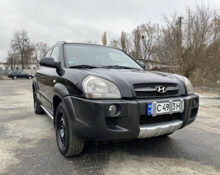 Черный Хендай Туксон, объемом двигателя 2 л и пробегом 330 тыс. км за 4350 $, фото 1 на Automoto.ua