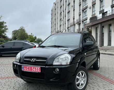 Чорний Хендай Туксон, об'ємом двигуна 1.98 л та пробігом 212 тис. км за 7499 $, фото 1 на Automoto.ua
