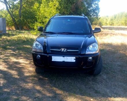 Черный Хендай Туксон, объемом двигателя 2 л и пробегом 236 тыс. км за 8300 $, фото 1 на Automoto.ua