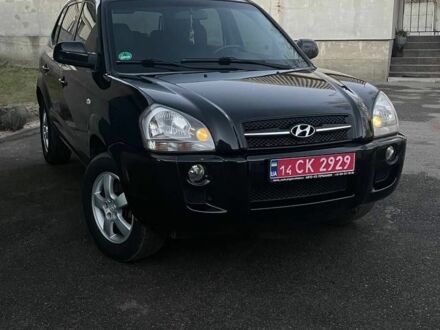 Черный Хендай Туксон, объемом двигателя 2 л и пробегом 211 тыс. км за 7800 $, фото 1 на Automoto.ua