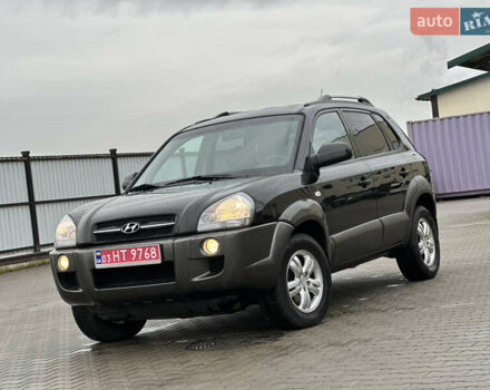 Чорний Хендай Туксон, об'ємом двигуна 2 л та пробігом 230 тис. км за 6850 $, фото 1 на Automoto.ua