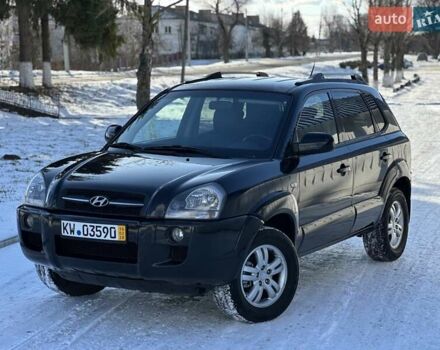 Черный Хендай Туксон, объемом двигателя 1.98 л и пробегом 223 тыс. км за 7900 $, фото 1 на Automoto.ua