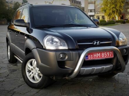 Черный Хендай Туксон, объемом двигателя 2 л и пробегом 230 тыс. км за 8700 $, фото 1 на Automoto.ua