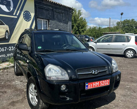 Черный Хендай Туксон, объемом двигателя 2 л и пробегом 198 тыс. км за 8600 $, фото 1 на Automoto.ua