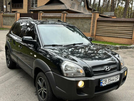 Черный Хендай Туксон, объемом двигателя 1.99 л и пробегом 266 тыс. км за 7500 $, фото 1 на Automoto.ua