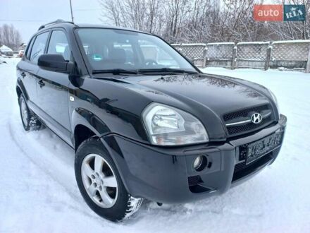 Чорний Хендай Туксон, об'ємом двигуна 1.98 л та пробігом 240 тис. км за 8550 $, фото 1 на Automoto.ua