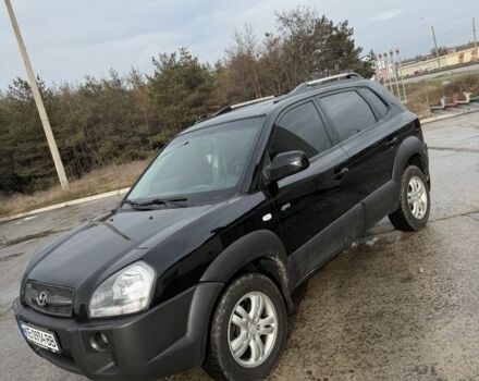 Черный Хендай Туксон, объемом двигателя 2 л и пробегом 200 тыс. км за 7999 $, фото 1 на Automoto.ua
