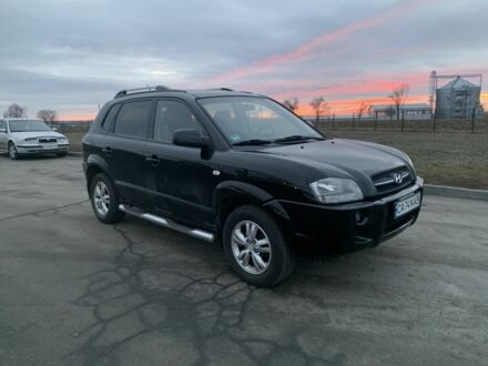 Черный Хендай Туксон, объемом двигателя 2 л и пробегом 170 тыс. км за 8800 $, фото 1 на Automoto.ua
