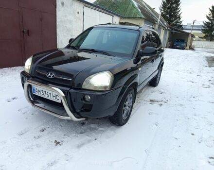 Черный Хендай Туксон, объемом двигателя 2 л и пробегом 260 тыс. км за 7900 $, фото 1 на Automoto.ua