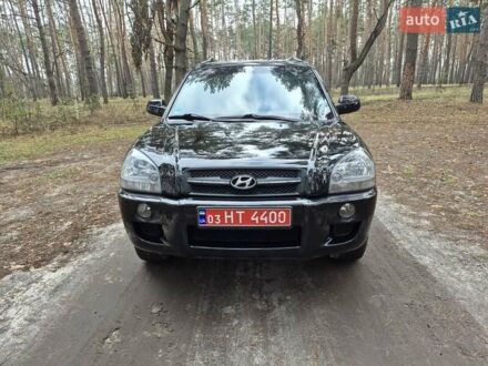 Черный Хендай Туксон, объемом двигателя 2 л и пробегом 198 тыс. км за 7700 $, фото 1 на Automoto.ua