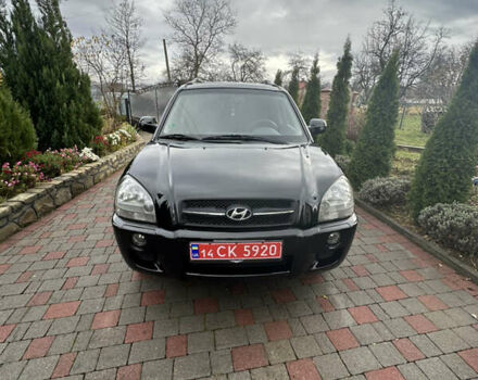 Черный Хендай Туксон, объемом двигателя 2 л и пробегом 218 тыс. км за 7400 $, фото 1 на Automoto.ua