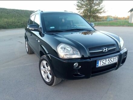 Черный Хендай Туксон, объемом двигателя 2 л и пробегом 240 тыс. км за 2700 $, фото 1 на Automoto.ua